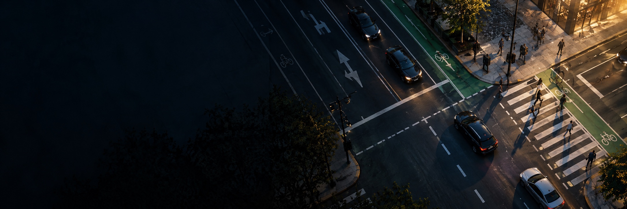 Illustrative road intersection with lane markings and pedestrian crossings